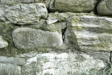 Stone wall, texture, pale color. Close up.