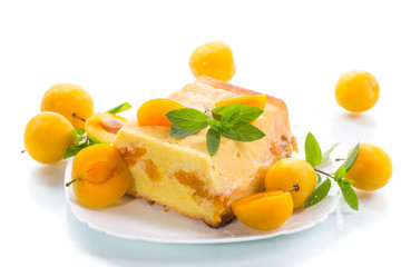 sweet curd casserole stuffed with yellow plums inside