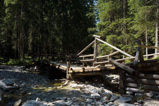 Bridge collapsed due to a flooding of the mountain stream in the High Tatra,