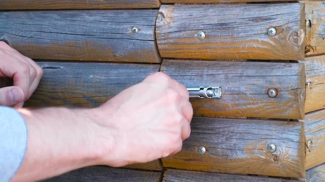 Close bolt on the wooden door.