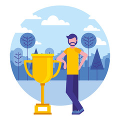 young man with trophy in landscape