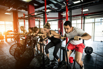 Fototapeta na wymiar Athletes training in a cross-fit gym