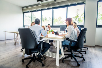 Brainstorming in a startup office