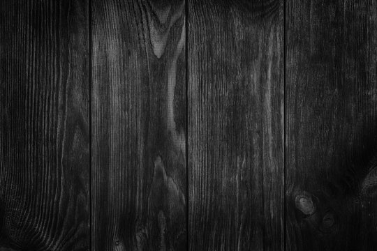 texture of black wood use as natural background, gloomy wooden table