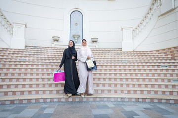 Two arabian girlfriends bonding and having fun