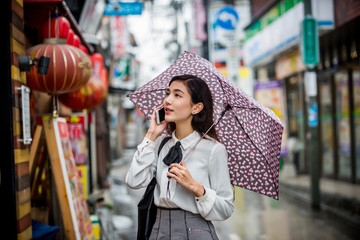 Fototapeta premium Young japanese girl outdoors