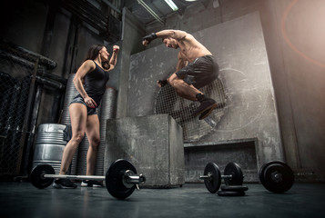 Couple training in a gym