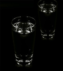glass of water in dark