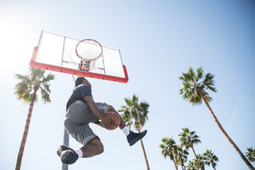 Baketball player making a dunk