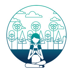 young woman with smartphone in landscape