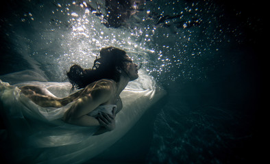 Fototapeta na wymiar Woman underwater
