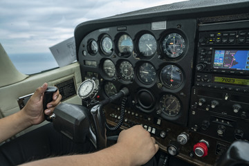 Pilot flying light aircraft.