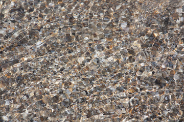 pebbles limestone under clean water