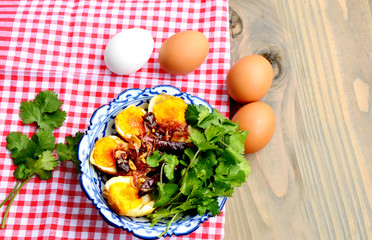 Fried Boiled Egg with Tamarind Sauce or Son-in-law Eggs.
 Thai style egg menu.