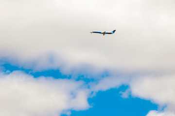  jet plane flies in clouds of sky