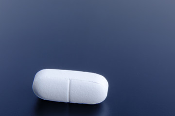 Pill isolated on black background with clipping path