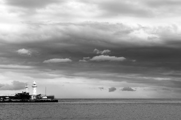 lighthouse in the sea. black and white photography