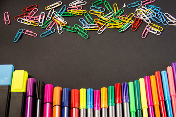 Office supplies for school on a black background