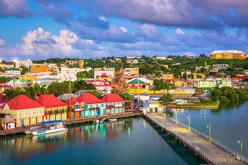St. John's, Antigua Quay and town skyline in the Caribbean at twilight.
