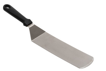 A silver spatula angled diagonally