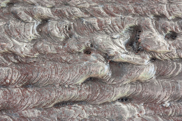 Steel sheet on which the welding of a coated electrode is practiced. Welding paths shown close up. Interesting and unique background. Horizontal photo.