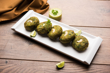 Hara bhara Kabab or Kebab is Indian vegetarian snack recipe served with green mint chutney over...