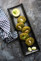 Hara bhara Kabab or Kebab is Indian vegetarian snack recipe served with green mint chutney over...