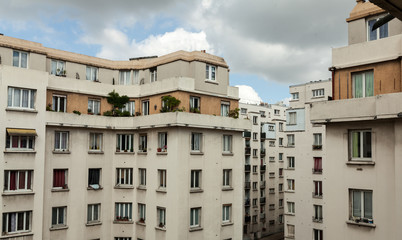 The old residential buildings and the blue sky. There are a lot of old buildingsin Paris