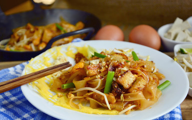 traditional version of Pad Thai or stir-fried rice noodles (Thai name is Pad Thai  baep dang derm).
 stir-fried rice noodles is popular  dish in the Thai cuisine and street food .