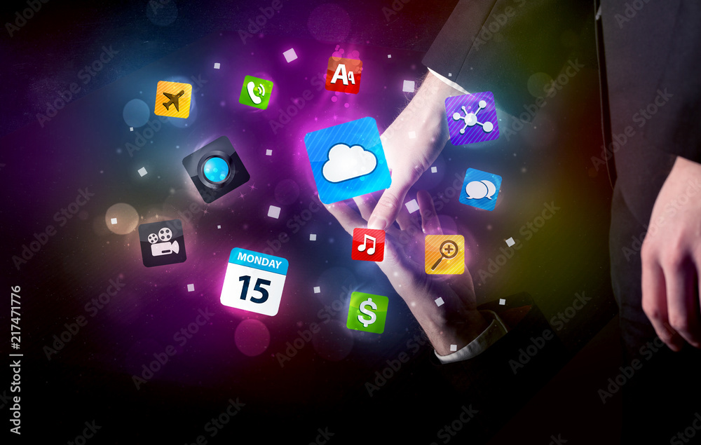 Poster Male hands touching interactive table with colorful application icons on it 
