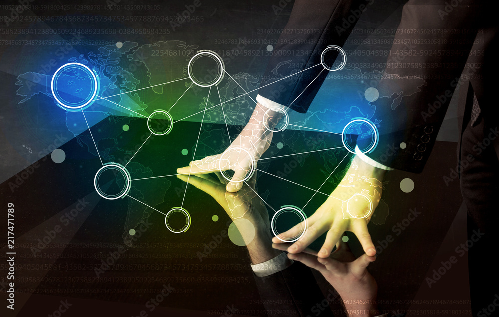 Poster Male hands touching interactive table with colorful world map on it 