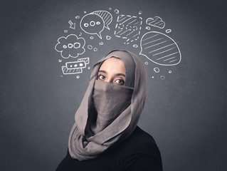 Young muslim woman wearing niqab with drawn speech bubbles above her head 