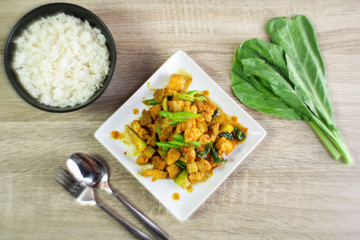 fried red curry paste with pork and chinese kale