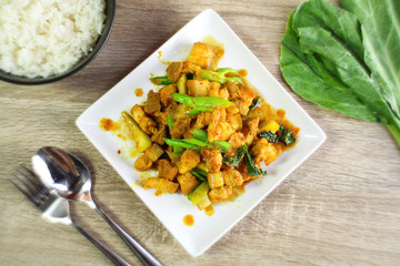 fried red curry paste with pork and chinese kale