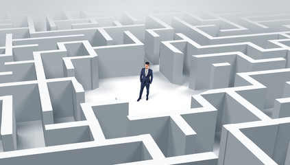 Young businessman standing in a middle of a 3D maze
