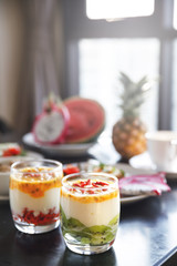 Two glasses with fresh low fat and lactose free yogurt