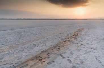 Sunset over the empty dry salt lake of Larnaca in Cyprus