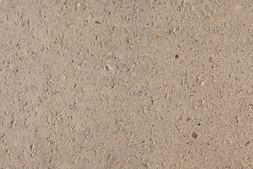 The texture of old asphalt on the road