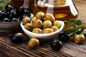 olives and olive oil. fresh organic black and green olives
