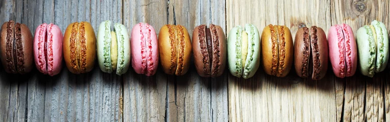 Türaufkleber Sweet and colourful french macaroons or macaron on white background, Dessert. © beats_