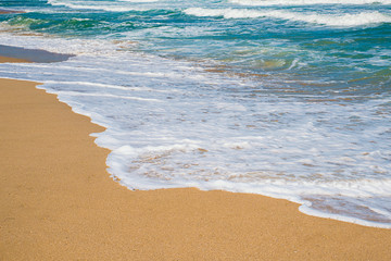 Sandy beach and blue ocean