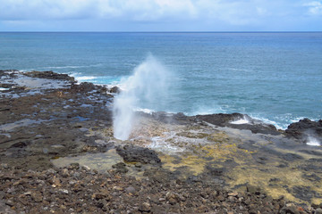 Spectacular Spouting Horn, a scenic blowhole on the South Shore of Kauai near Poipu, Hawaii