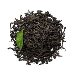 Dried black tea leaves isolated on white background. Top view.