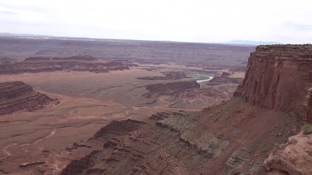 Mountain landscape of red erosion rocks and salt lake in Canyonlands National Park, Utha