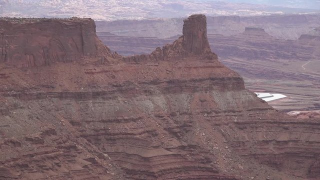 Mountain landscape of red erosion rocks and salt lake in Canyonlands National Park, Utha