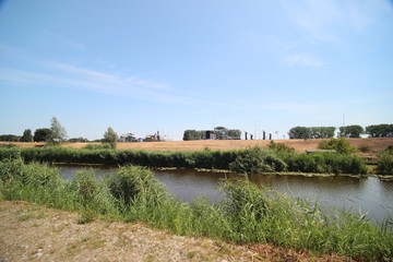 Fototapeta na wymiar Fields and farms in the Zuidplaspolder in Moordrecht in the Netherlands.