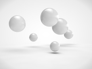 The image of the set of balls of different size, white color, randomly located in space. Image isolated on a white background. 3D rendering