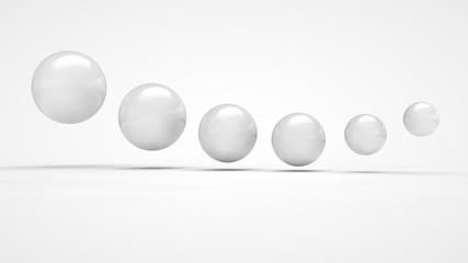 The image of the set of balls of various sizes, in white, is positioned in space in order. Image isolated on a white background, the symbol of order and purpose. 3D rendering