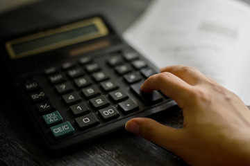 a person counts on a calculator