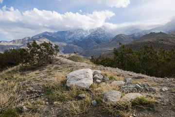 Rocks and Snowy Peaks